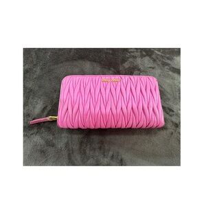 Miu Miu Large Dark Pink matelassé nappa leather wallet with authentication cards
